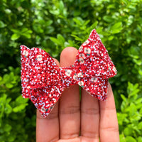 Adorable and sparkly red apple glitter Bella bows!