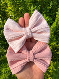 Gorgeous cable knit nylon fabric bow clips or headbands.