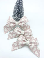 Gorgeous blush Christmas tree print bows!