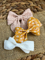 Embossed floral lace faux leather Sailor bows!