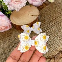 Adorable happy Daisy pigtail bows!