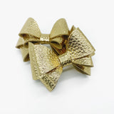 Metallic gold Bella double layer bows