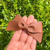 Beautiful solid colour smooth faux leather Lucy bows!