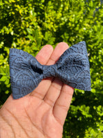 Embossed floral lace faux leather bow ties!