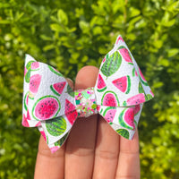 Adorable pink and green watermelon print and sparkly glitter bows