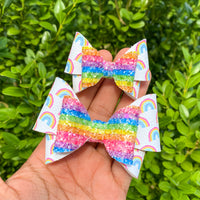 Adorable rainbow print and glitter bows!