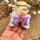 Beautiful pink, purple and blue floral bows!