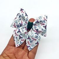 Beautiful floral holly bows, perfect for Christmas!
