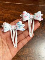 Gorgeous floral faux leather bow snap clips!