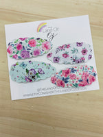 Floral faux leather scalloped or smooth snap clips in gorgeous colours!