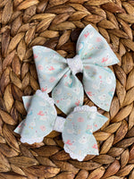 Adorable mint and white swan bows!