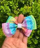 The cutest scalloped print rainbow bows!