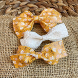 Gorgeous mustard floral bows!