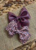 Gorgeous tawny or raisin coloured leopard print bows perfect for fall!