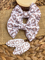 Gorgeous leopard XOXO cable knit nylon fabric bow clips or headbands.