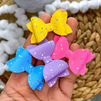 Bright and colourful tiny pigtail bows!