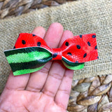 Bright and summery watermelon seed and rind print bows