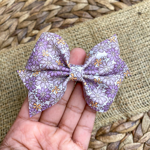 Beautiful muted purple floral bows!