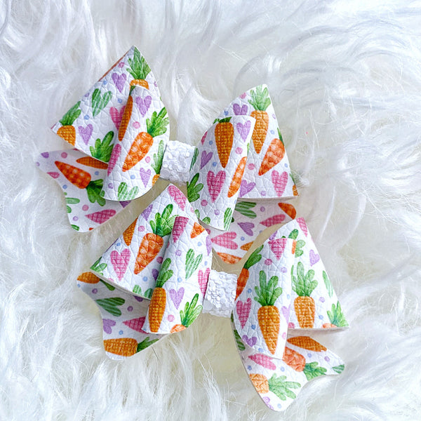 Adorable carrot and heart print bows, perfect for Easter!