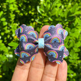 Gorgeous dark rainbow print bows!
