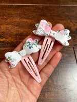 Gorgeous floral faux leather bow snap clips!