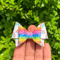 Adorable rainbow print and glitter bows!