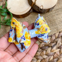 Beautiful blue and yellow floral bows!