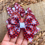 Gorgeous black and red snowflake plaid bows, perfect for the holidays!