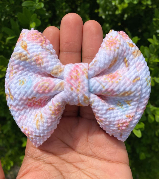 Muted floral bullet fabric bow clips or headbands.