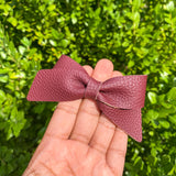 Beautiful solid colour pebble faux leather Lucy bows!