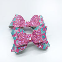 Adorable teal and pink heart bows, perfect for Valentine's Day!
