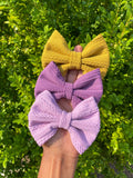 Gorgeous cable knit nylon fabric bow clips or headbands.