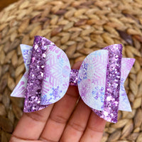 Gorgeous pink, purple and blue snowflake bows!