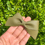 Beautiful solid colour pebble faux leather Lucy bows!