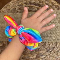Super soft rainbow bright velvet bunny ear scrunchies!