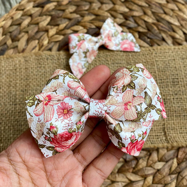 Gorgeous floral bows with a subtle pink vintage feel!