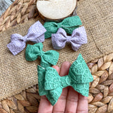 Embossed floral lace bows