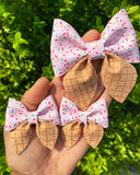 Pink sprinkle ice cream bows, perfect for summer!