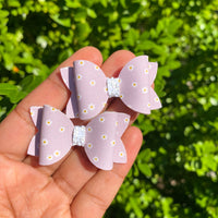 Beautiful dainty muted floral daisy pigtail bows!