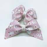 Adorable muted blush and white snowmen bows!