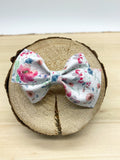 Pretty pastel floral bows in many different styles!