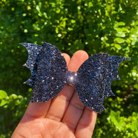 Super sparkly and spooky black glitter bat bows!