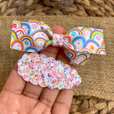 Super happy, colourful flower and rainbow bows!