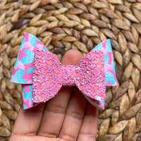 Adorable teal and pink heart bows, perfect for Valentine's Day!