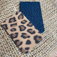 Gorgeous leopard faux suede or floral embossed magnetic bookmarks!