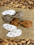 Adorable neutral scalloped snap clips in beautiful patterns and textures!