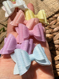 Gorgeous shimmer wave 2" stacked pigtail bows!