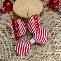 Adorable candy cane stripe bows, perfect for the holidays!