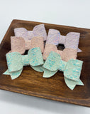 Gorgeous glitter lace bows in perfect pastel colours for spring and summer!
