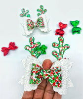 Super sparkly white, green and red glitter reindeer bows, perfect for Christmas!